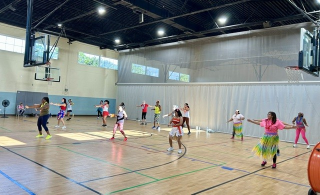 A lively dance fitness class in full swing